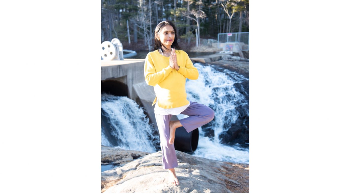 Girl Doing Tree Pose With Yoga Services