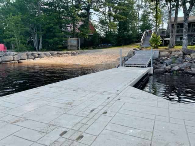 RC Excavatoin dock, retaining wall, and boat launch. Landscape Contruction